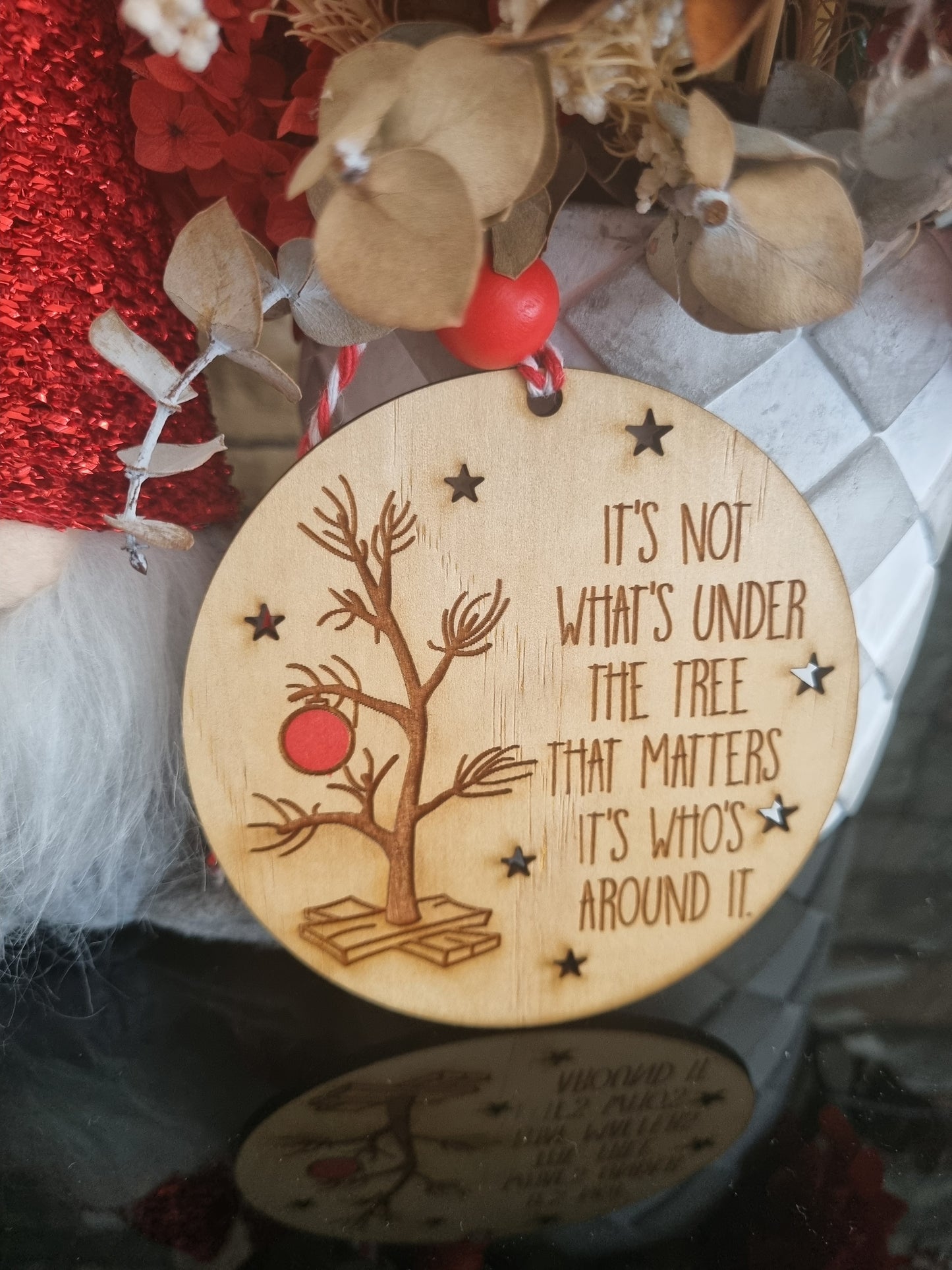 It's not what's under the tree Ornament